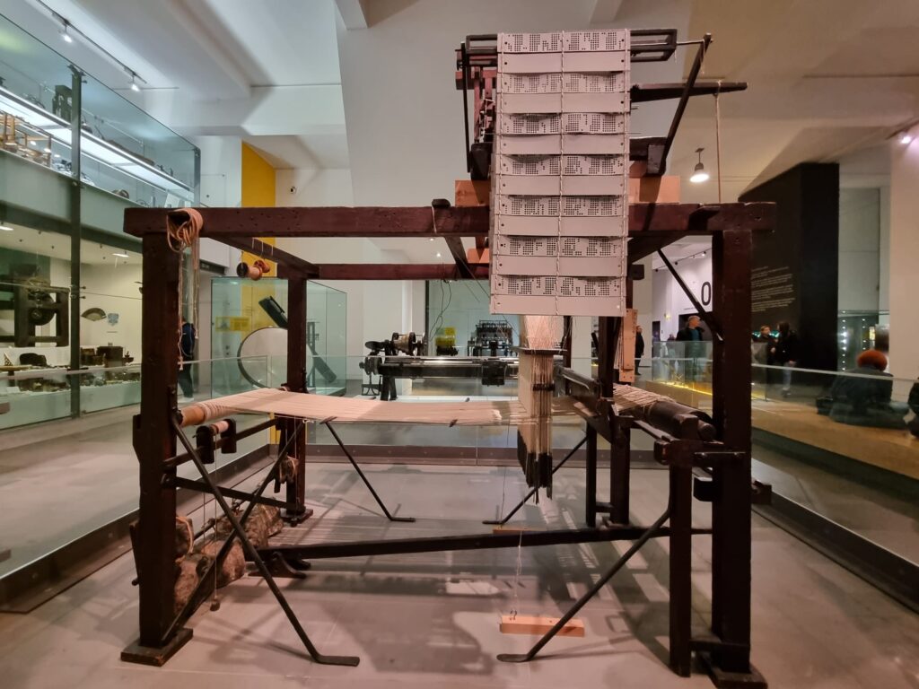 Old-fashioned loom machine photographed in a museum in London.